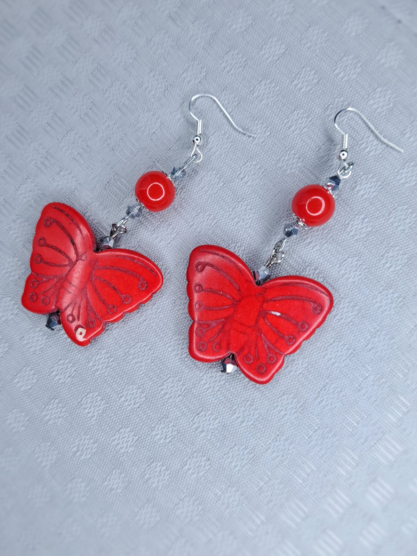 Red howlite butterfly stainless steel earrings
