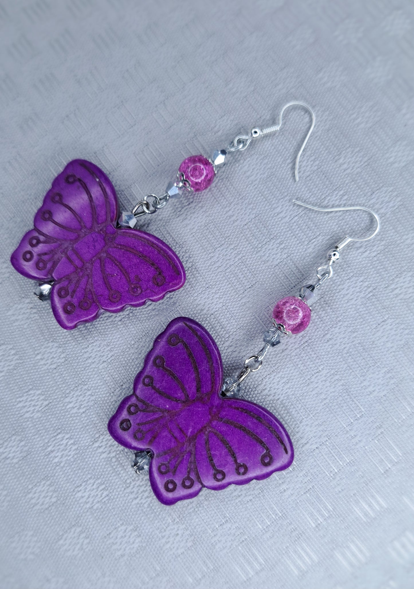 Purple howlite butterfly stainless steel earrings