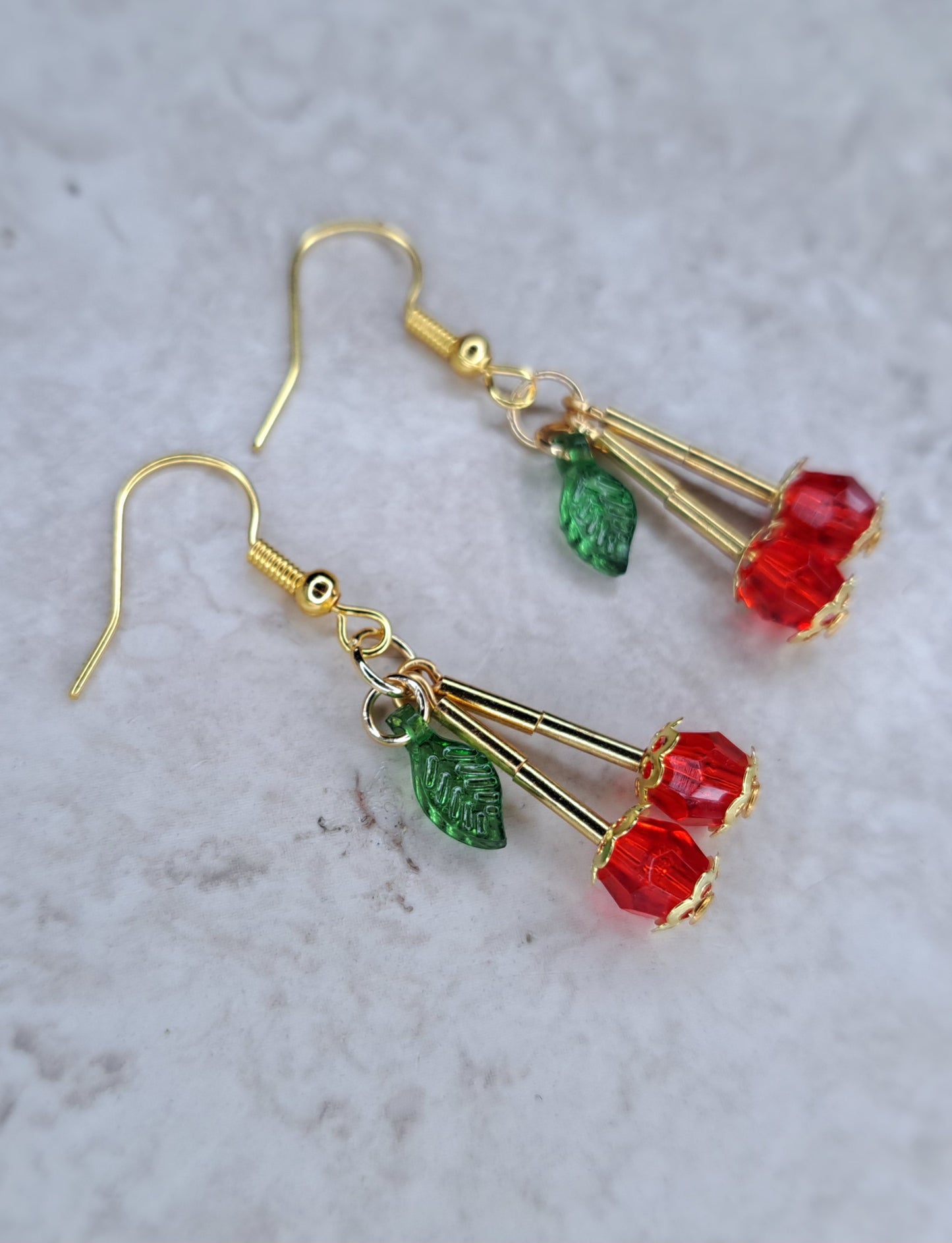 Cherry and gold stainless steel dangle bead earrings