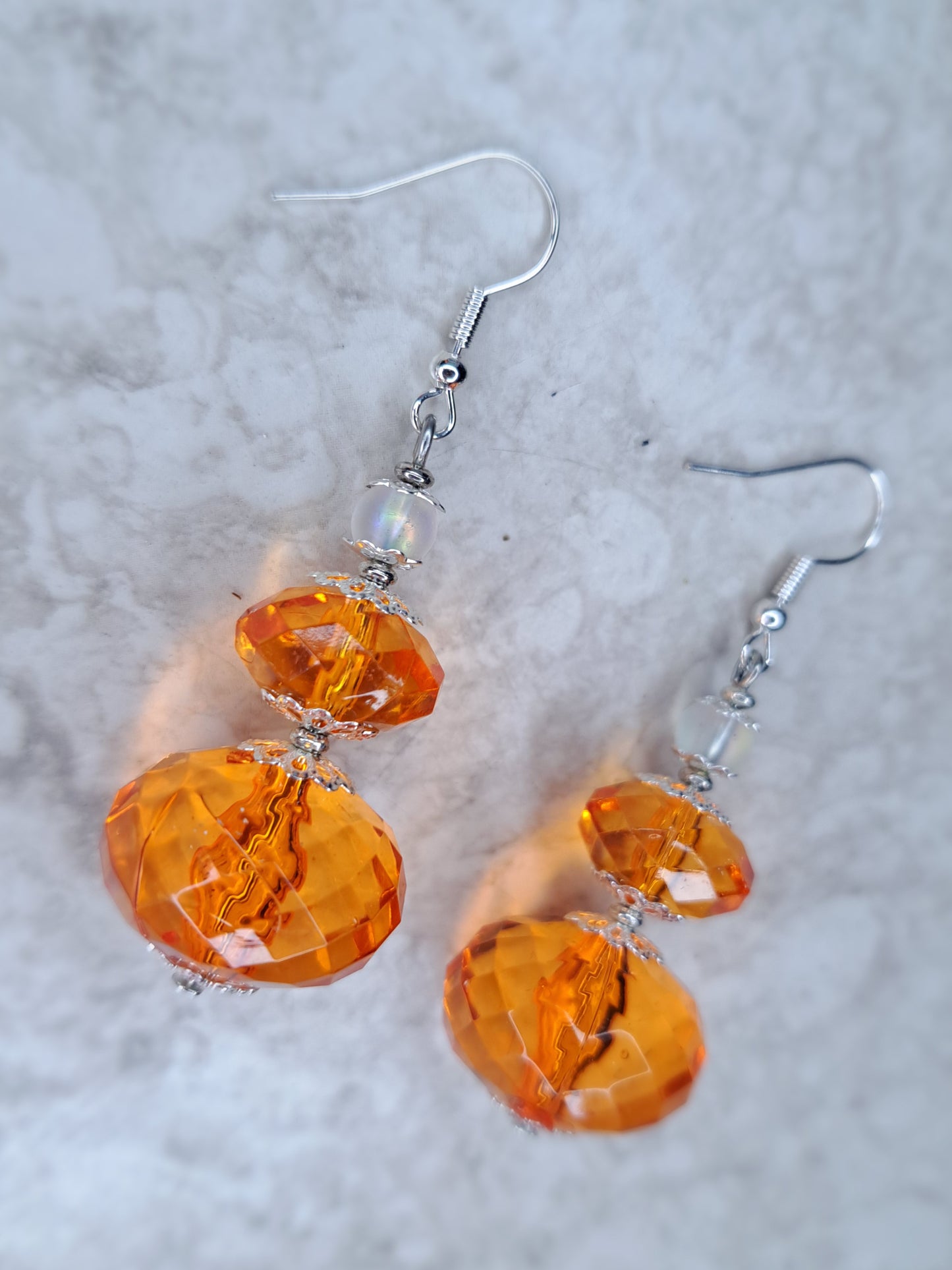 Orange beaded stainless steel earrings
