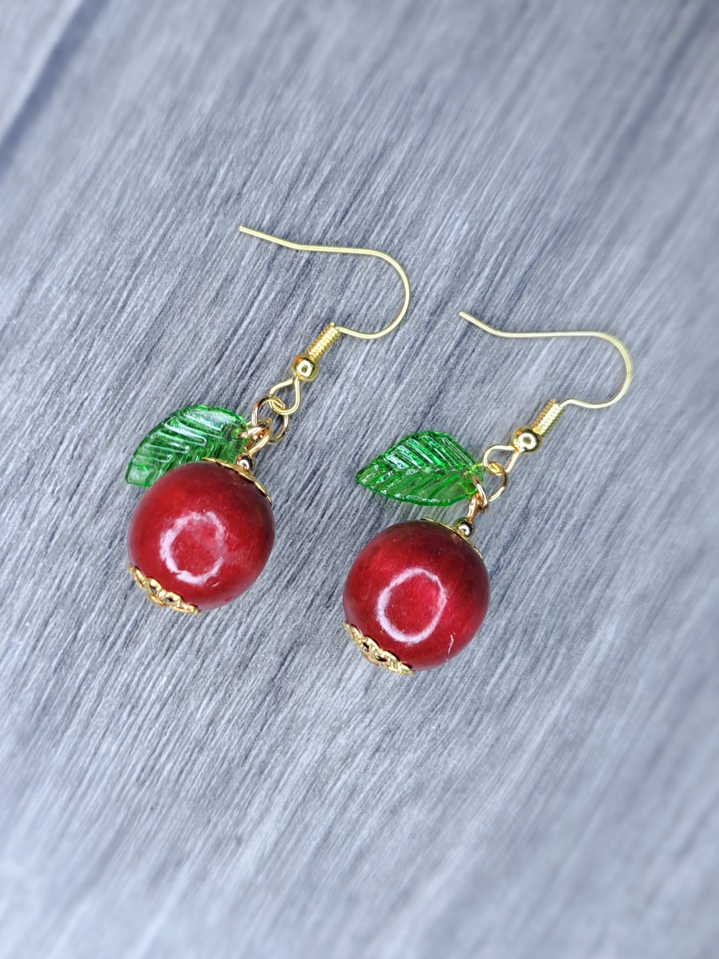 Apple gold tone stainless steel earrings
