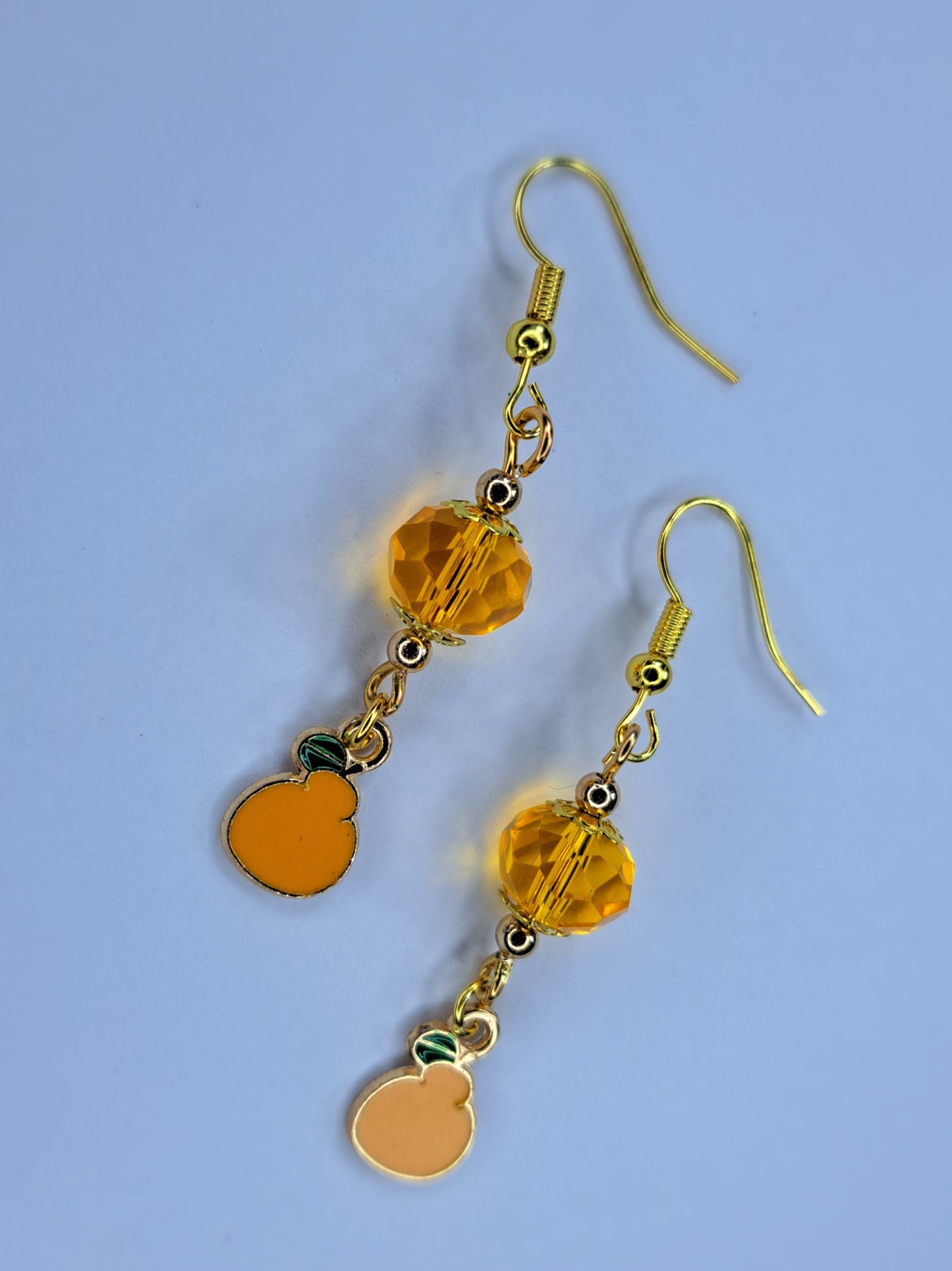orange and gold stainless steel earrings