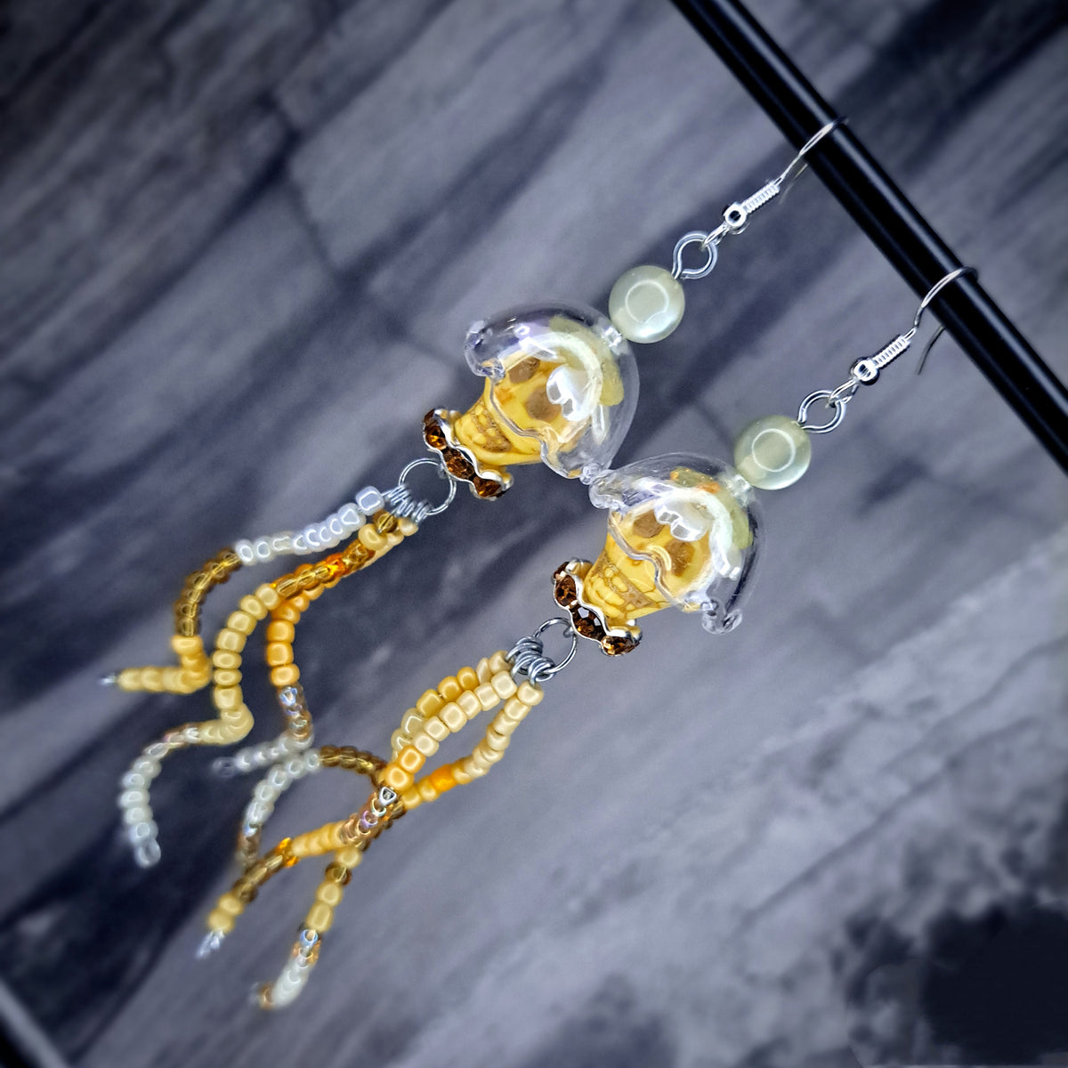 Yellow howlite skull jellyfish stainless steel earrings
