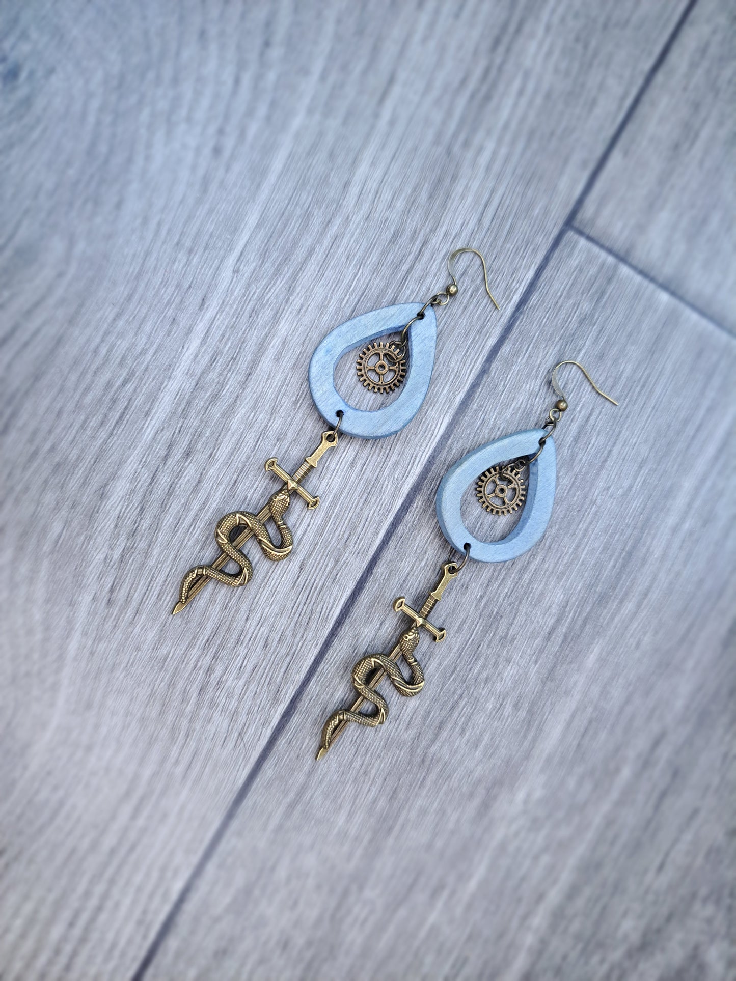 Blue wood & bronze sword snake heart hoop earrings