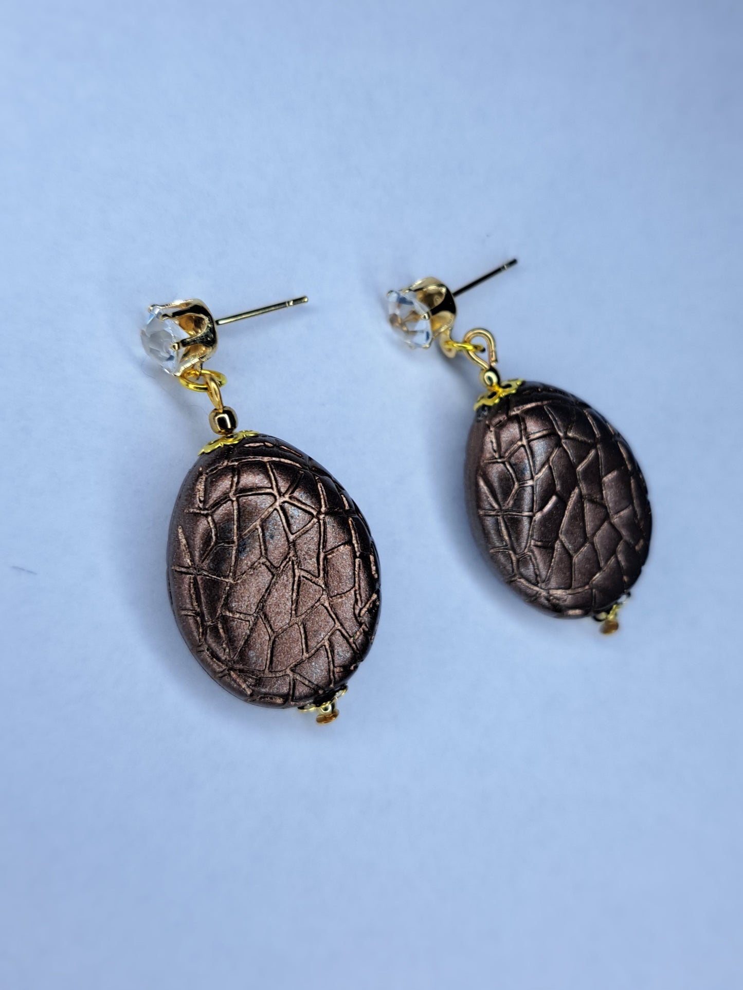 Gold tone beaded stainless steel earrings