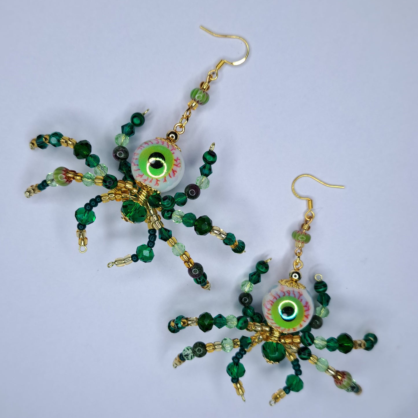 Green beaded eyeball spider gold tone s925 sterling silver earrings
