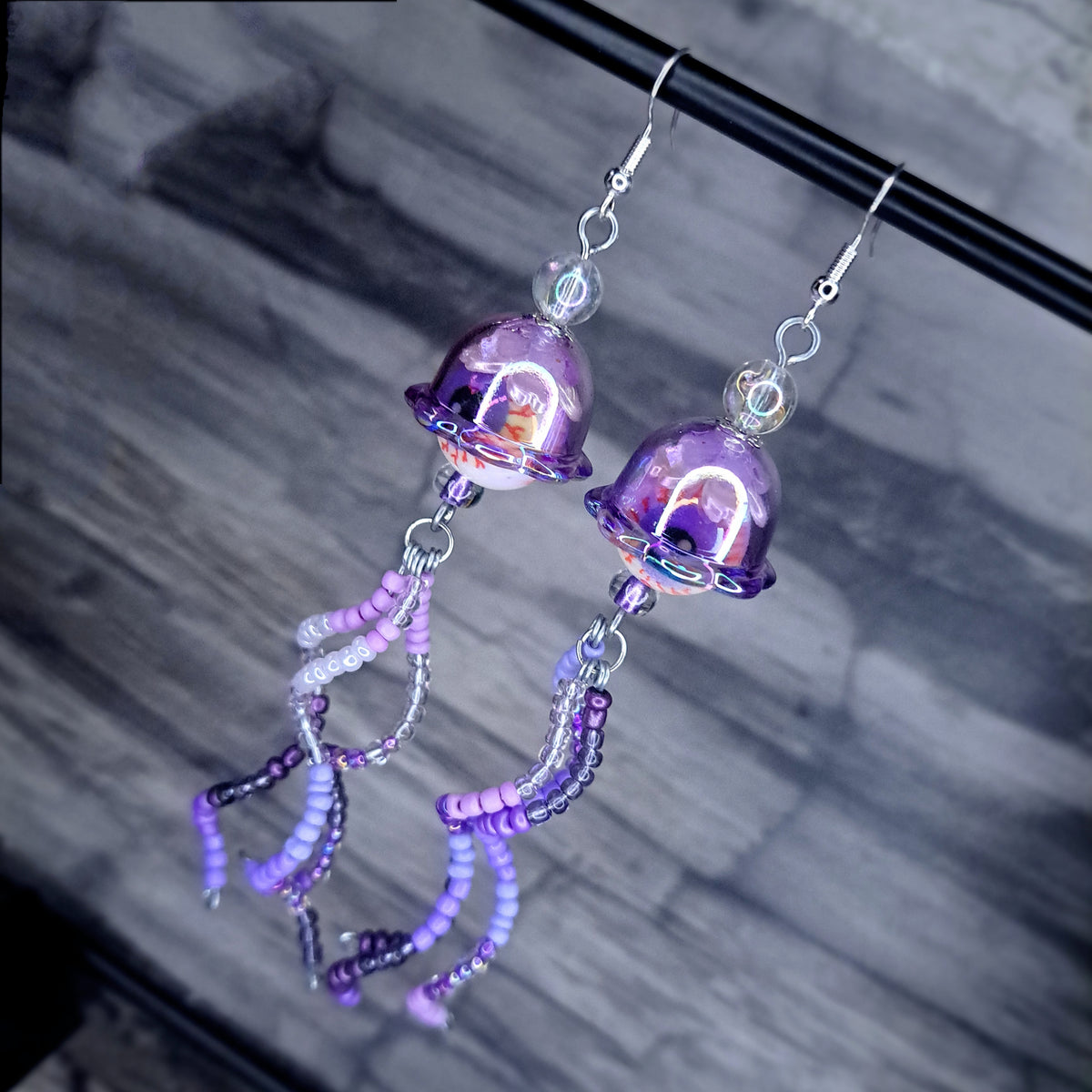 Purple Eyeball jellyfish stainless steel earrings