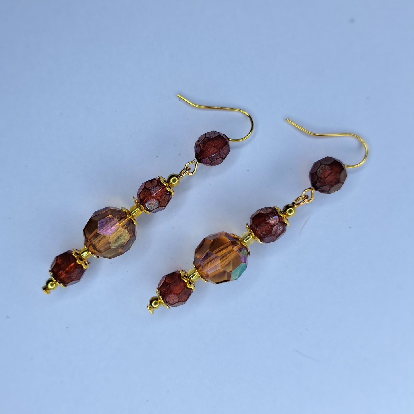 Amber beaded gold tone stainless steel earrings