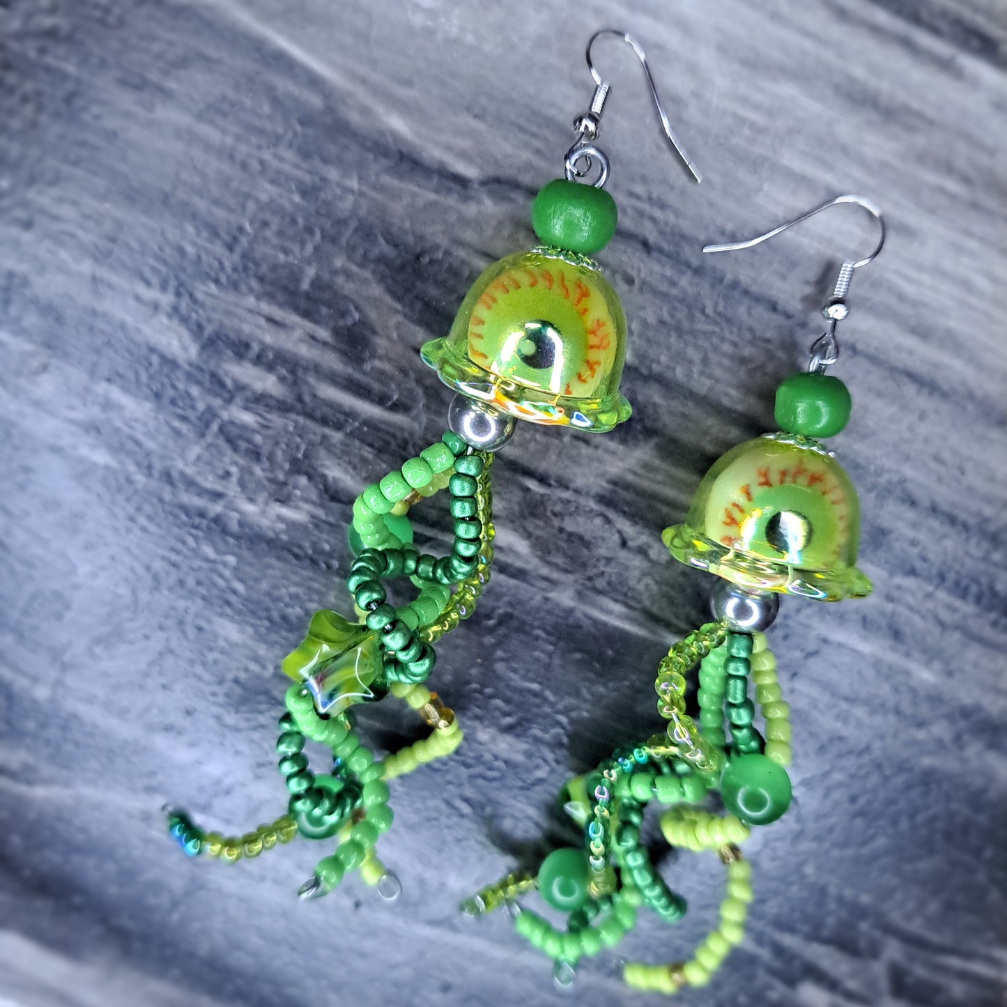 Green eyeball Jellyfish beaded stainless steel earrings