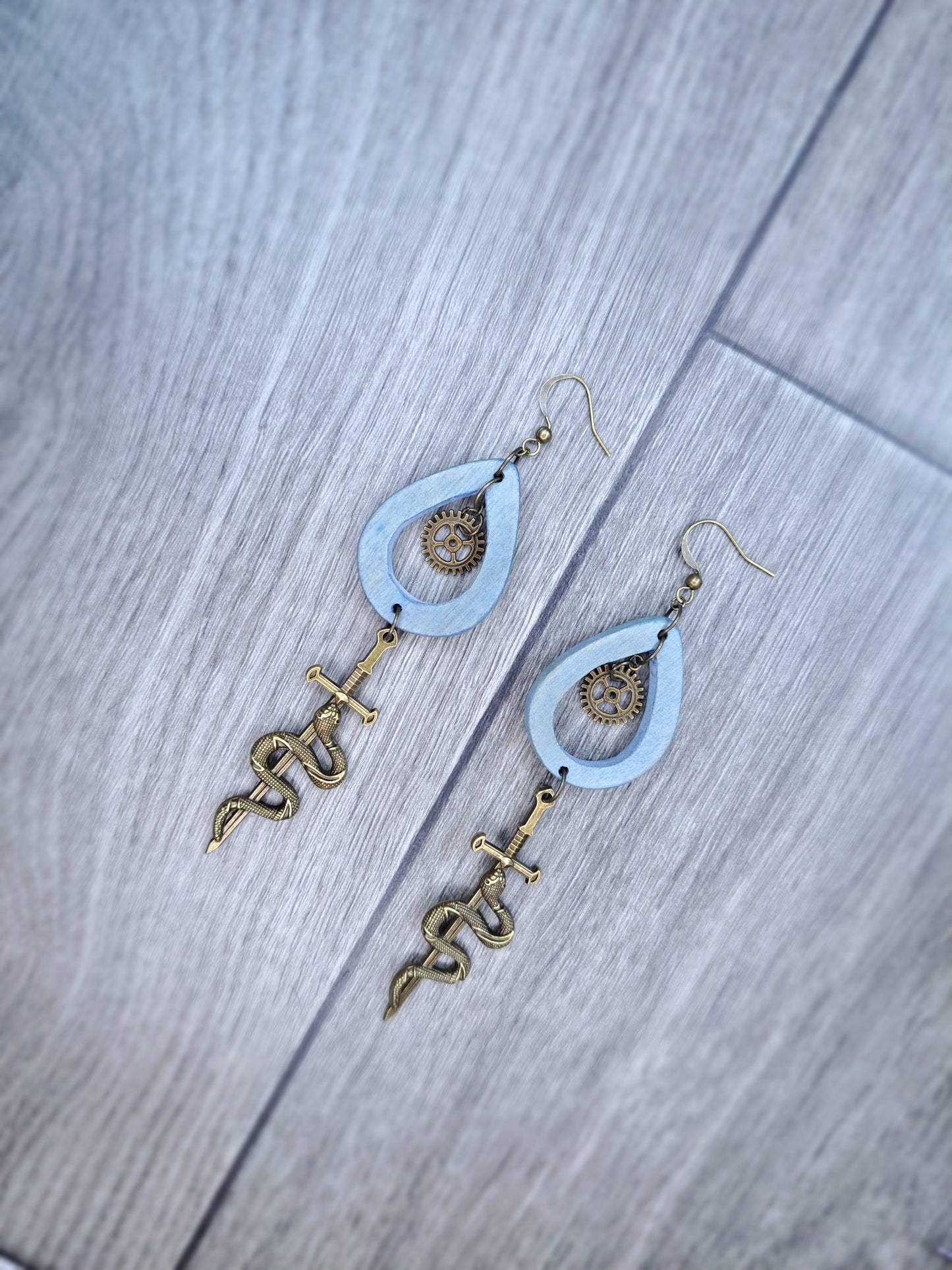 Blue wood & bronze sword snake heart hoop earrings