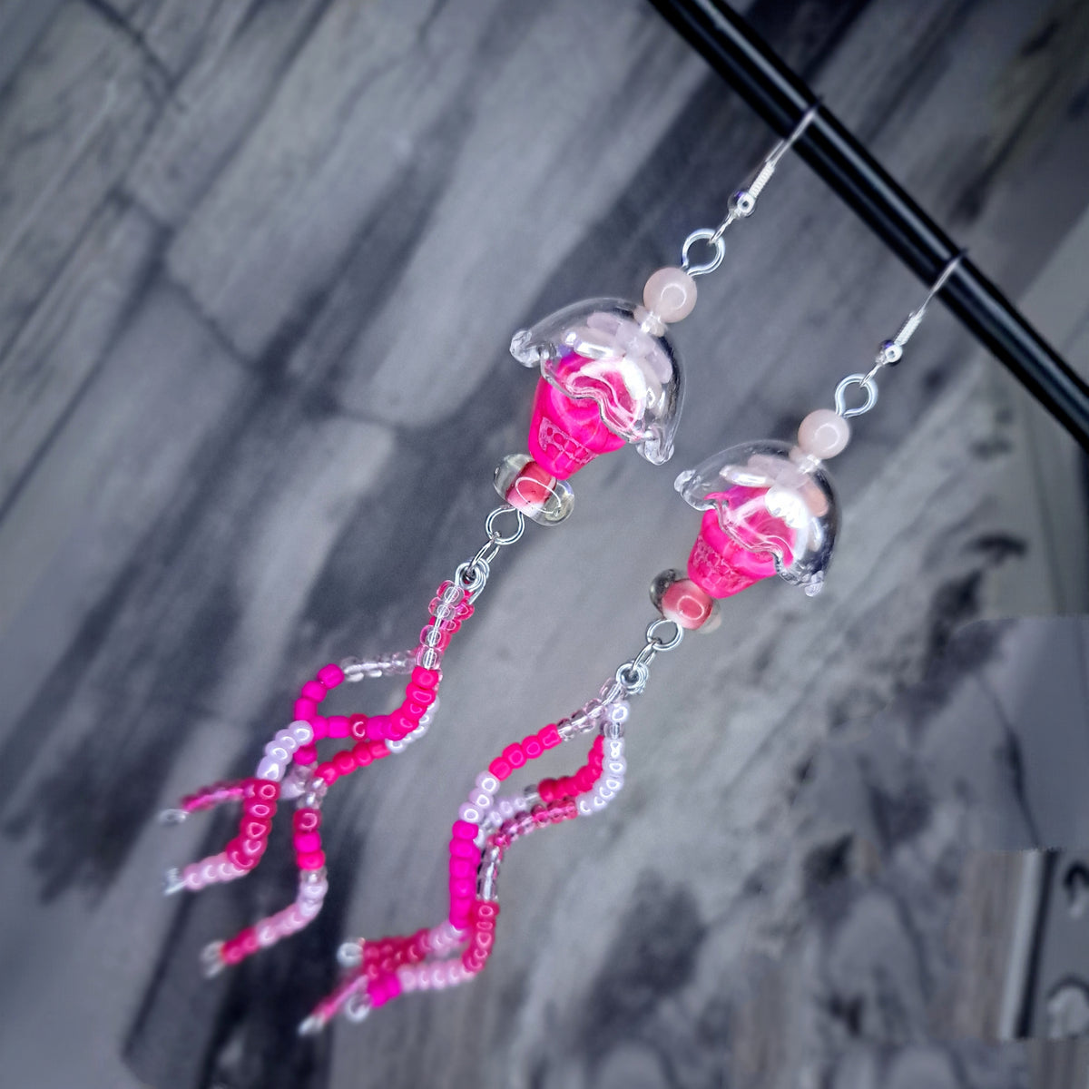 Pink howlite skull jellyfish stainless steel earrings