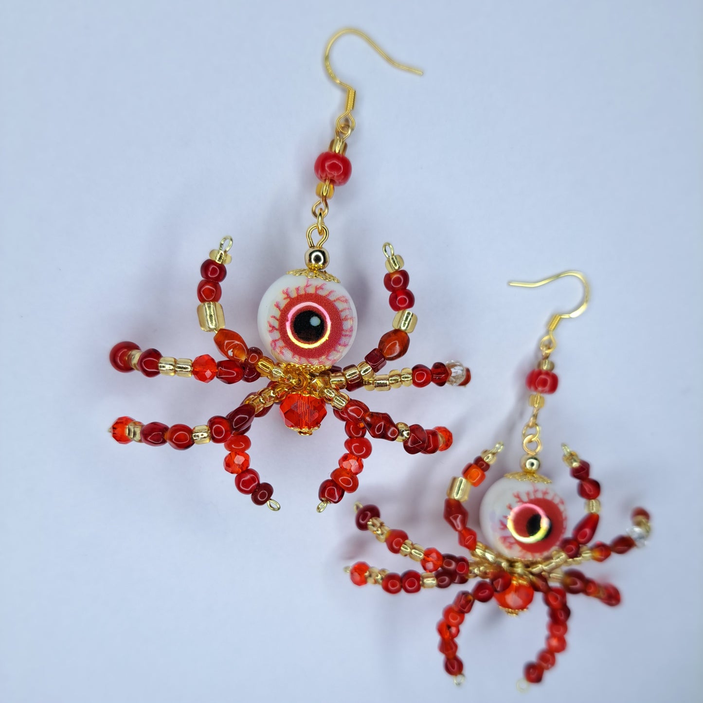 Red beaded eyeball spider gold tone s925 sterling silver earrings