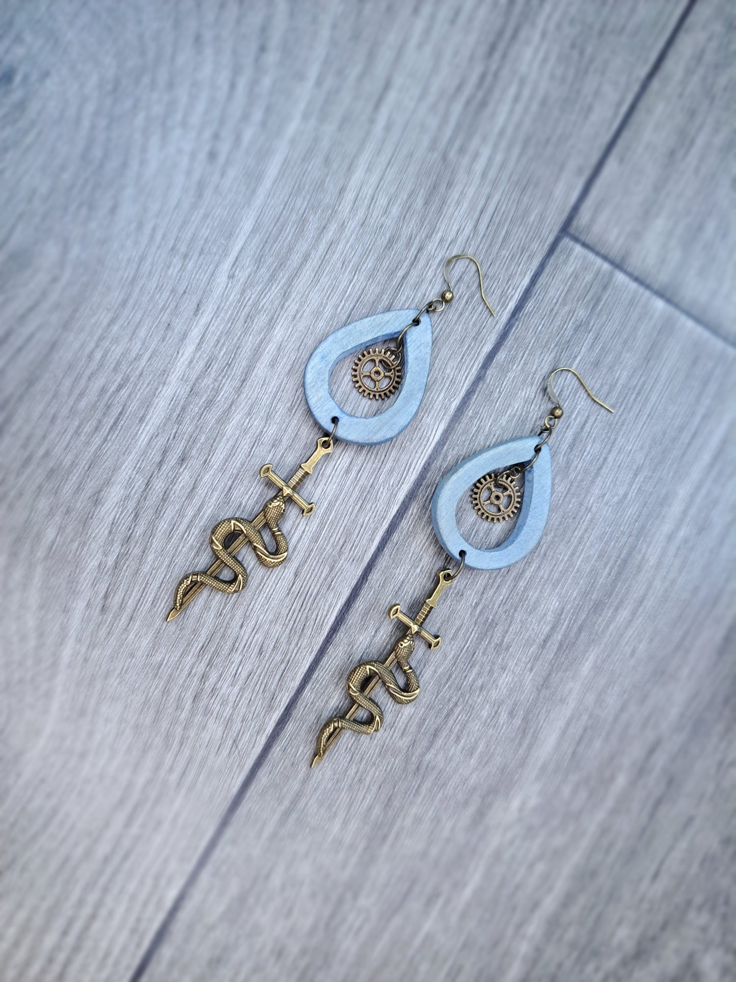 Blue wood & bronze sword snake heart hoop earrings
