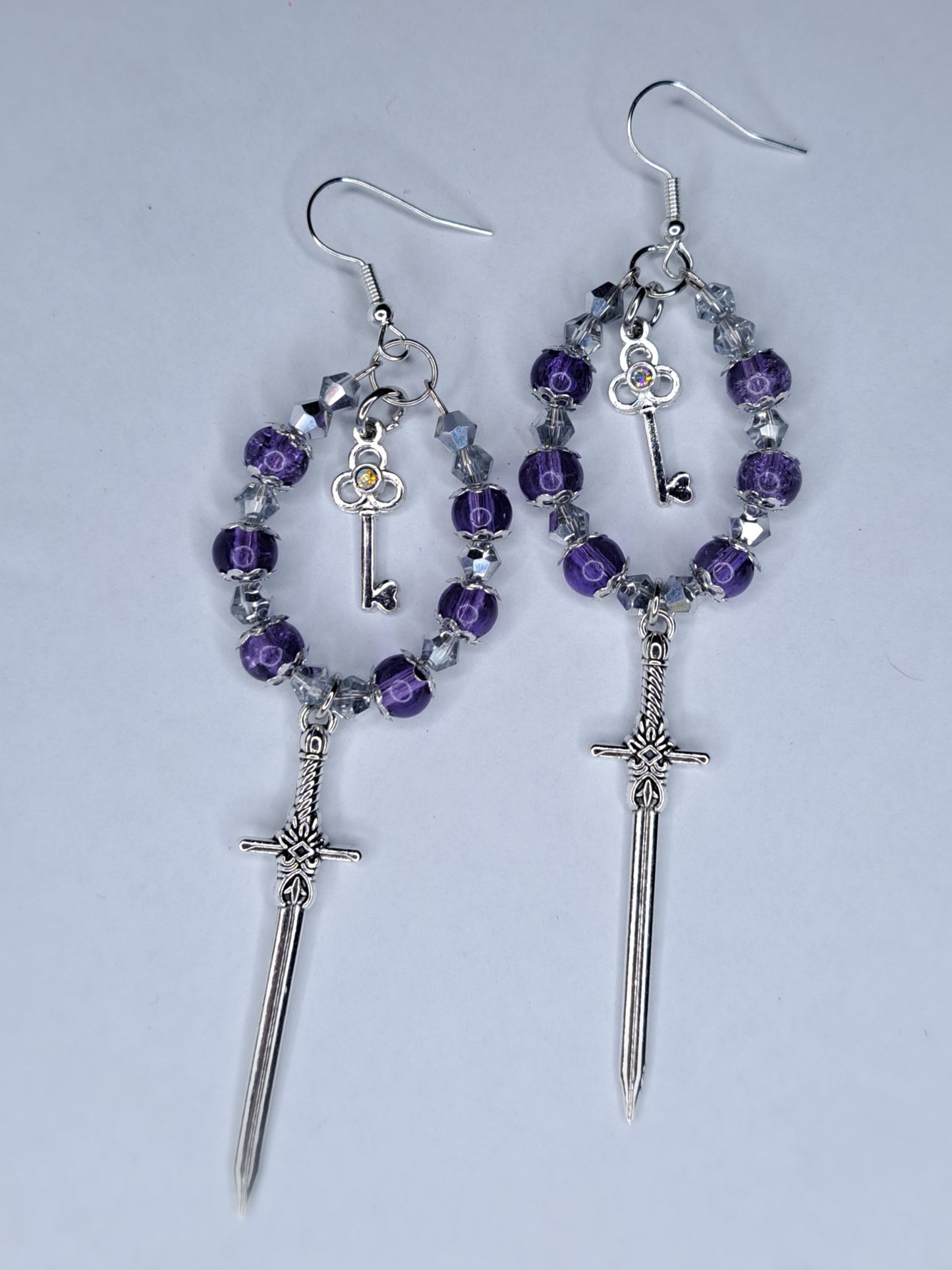 Indigo and silver beaded hoop key sword earrings stainless steel