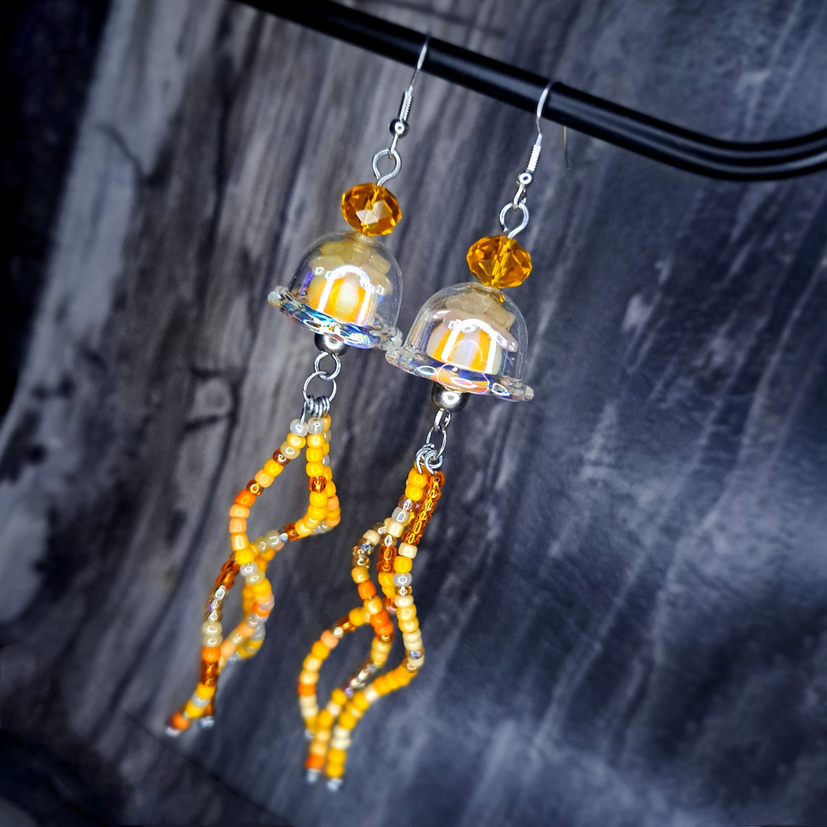 Orange and white jellyfish stainless steel earrings