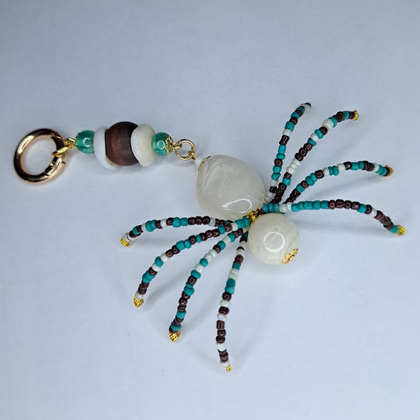 White brown and turquoise Beaded spider keychain