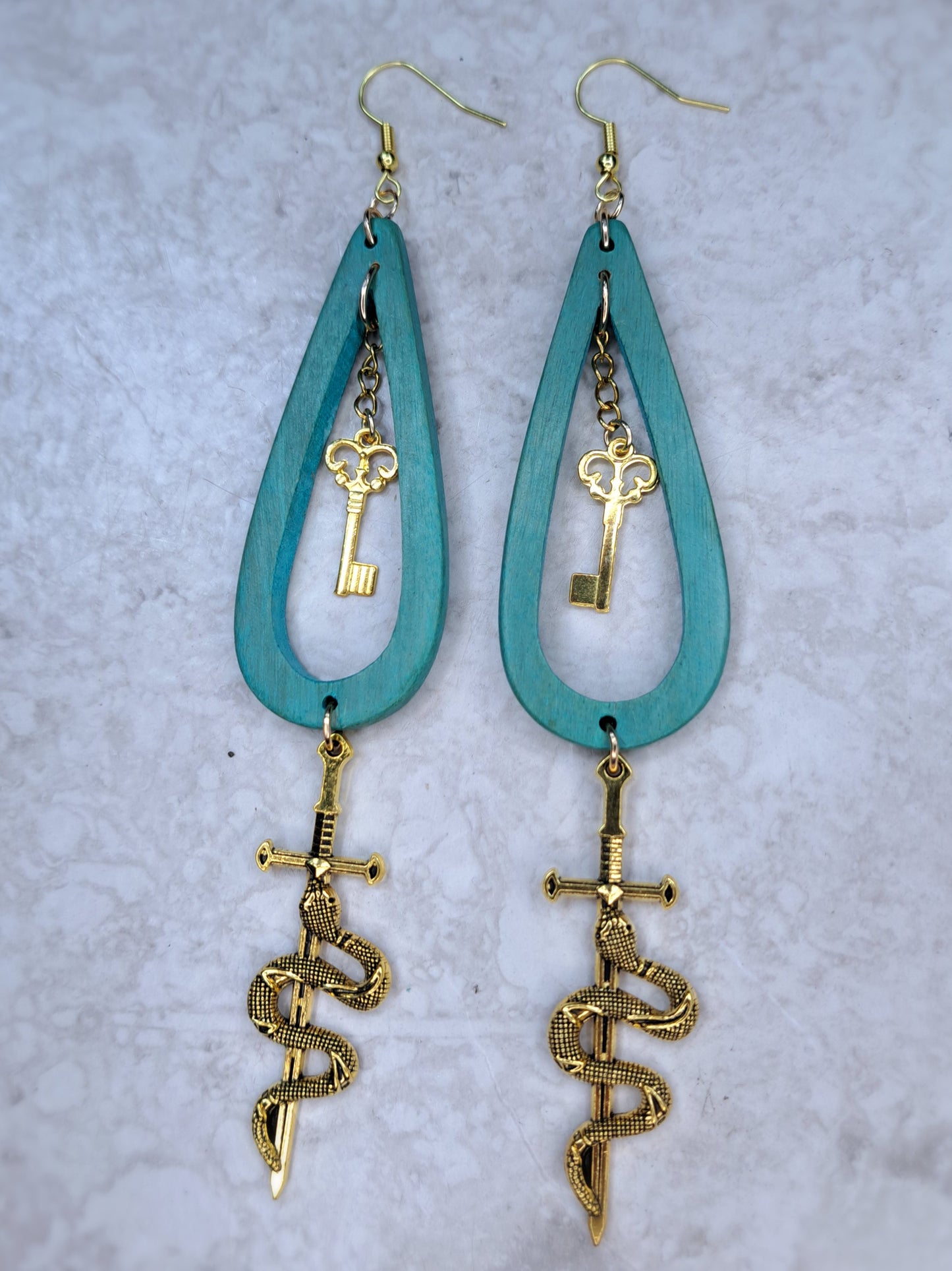 Greet wood beaded gold snake sword hoop earrings