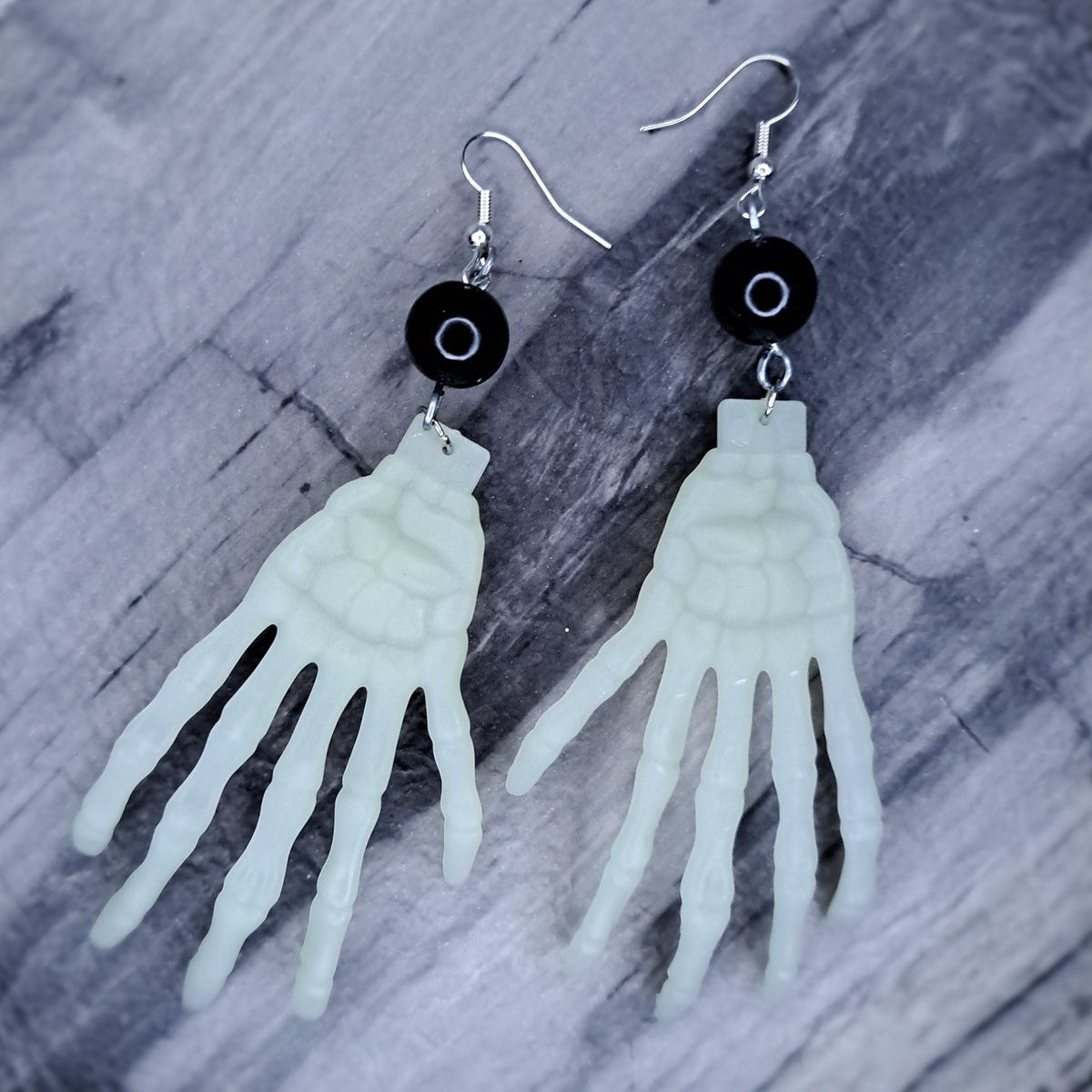 Glowing skeleton hand stainless steel earrings
