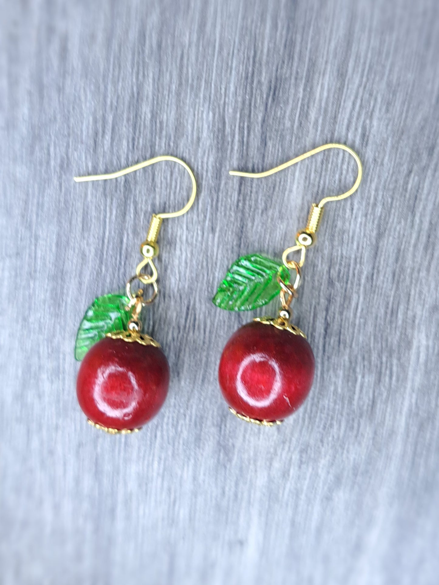 Apple gold tone stainless steel earrings