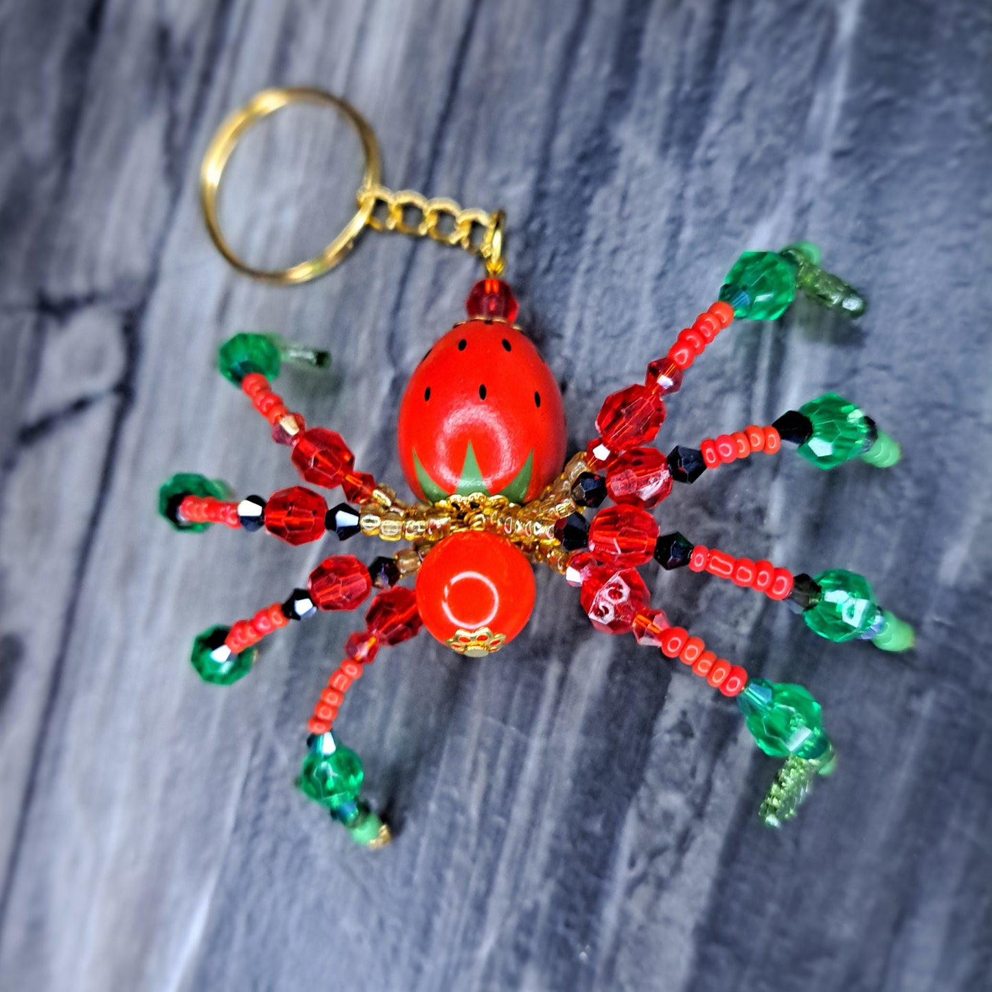 Strawberry Beaded spider gold tone keychain
