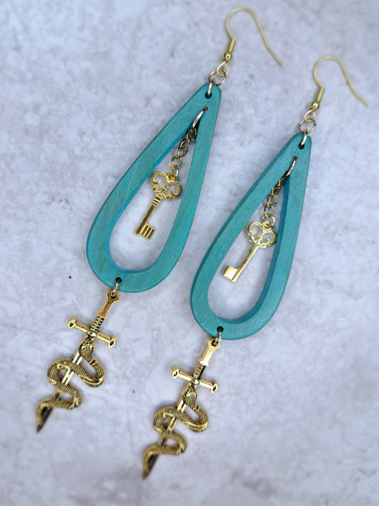 Greet wood beaded gold snake sword hoop earrings