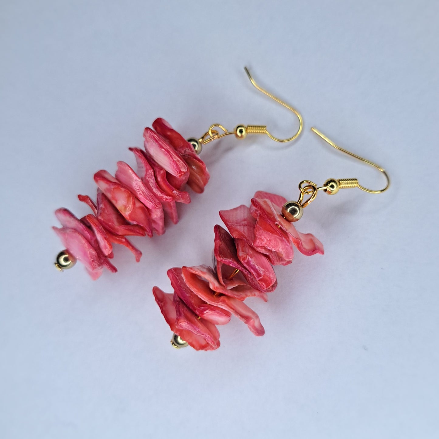 Pink shell and gold tone stainless steel earrings