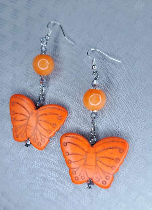 Orange howlite butterfly stainless steel earrings