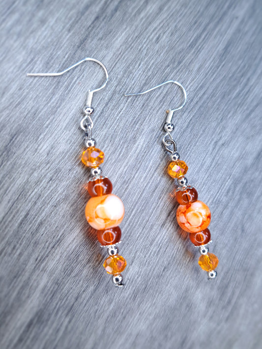 Orange beaded stainless steel earrings