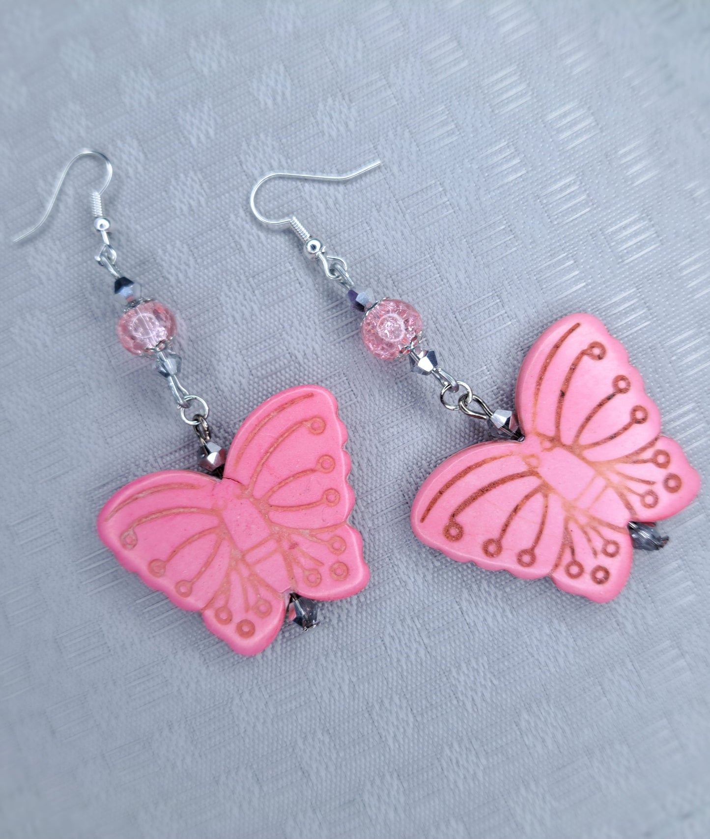 Pink howlite butterfly stainless steel earrings