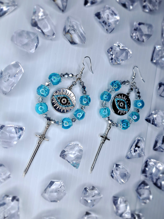Silver and blue beaded eye stainless steel sword hoops earrings
