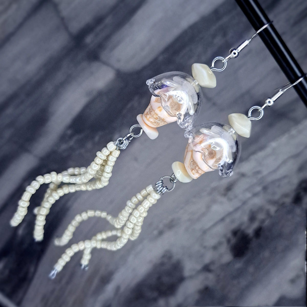 White howlite skull jellyfish stainless steel earrings