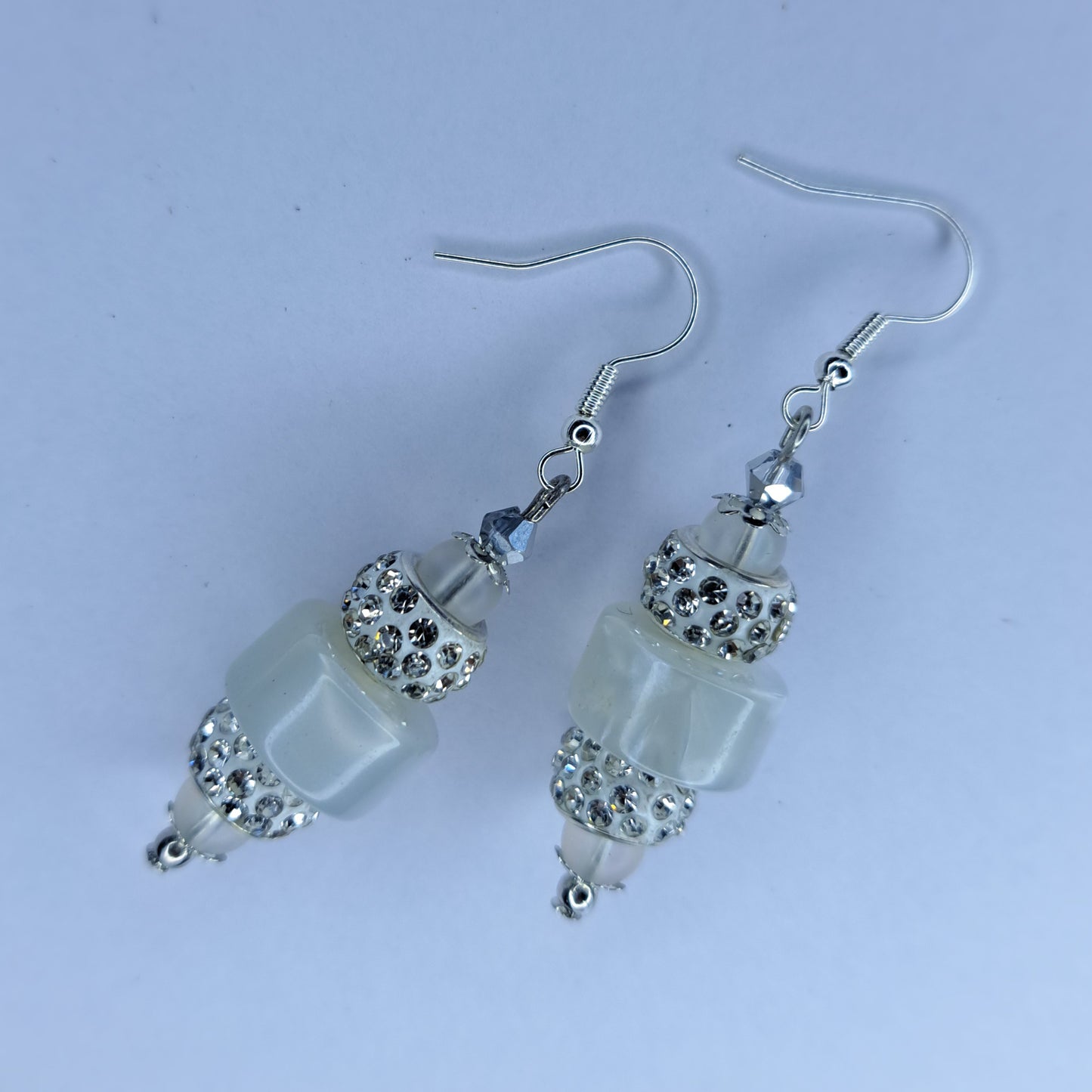 White beaded stainless steel earrings