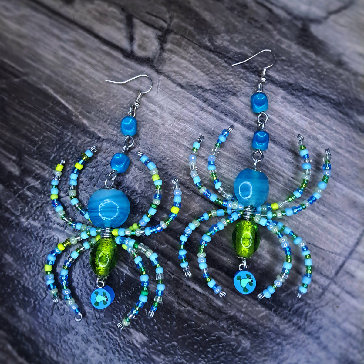 Blue and green spider stainless steel earrings