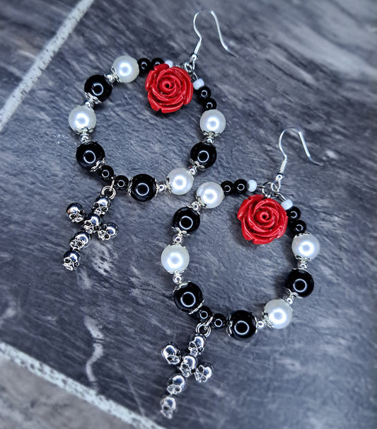 Black and white beaded stainless steel hoop cross earrings