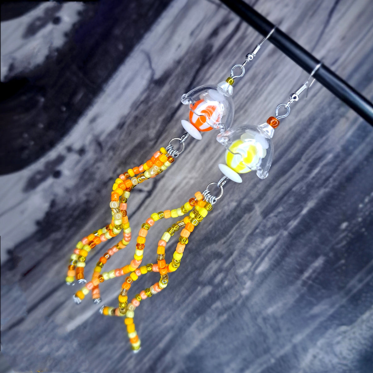Orange and yellow jellyfish stainless steel earrings