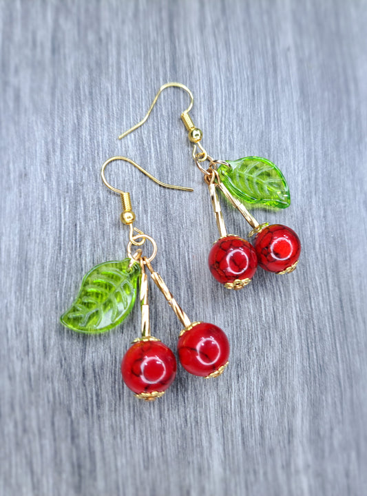 Quarts and peridot gold tone cherry stainless steel earrings