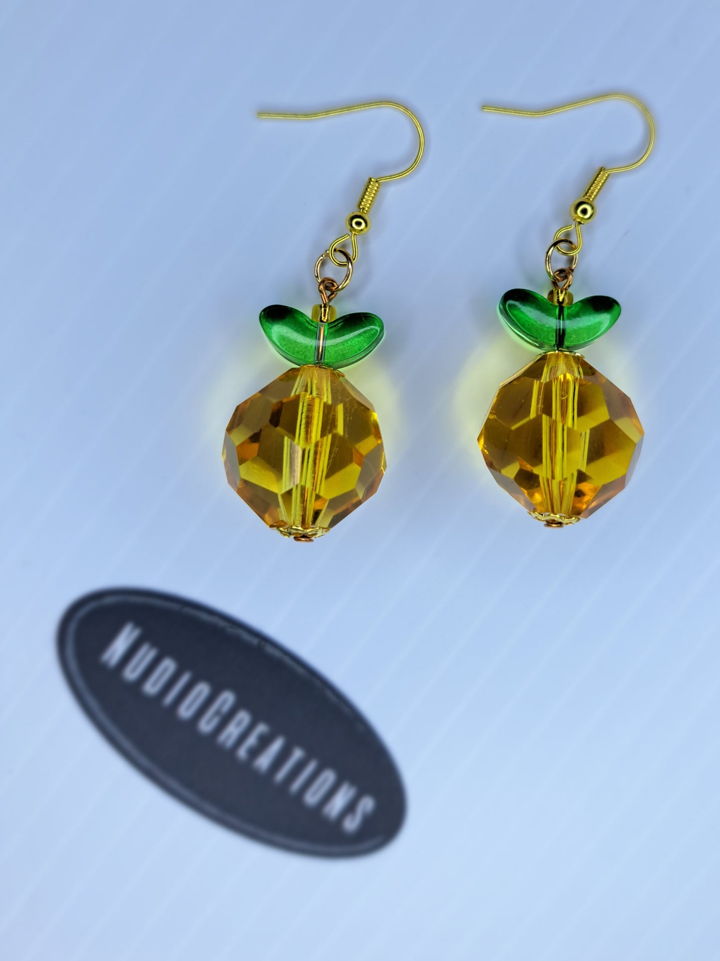 Pineapple beaded gold tone stainless steel dangle earrings