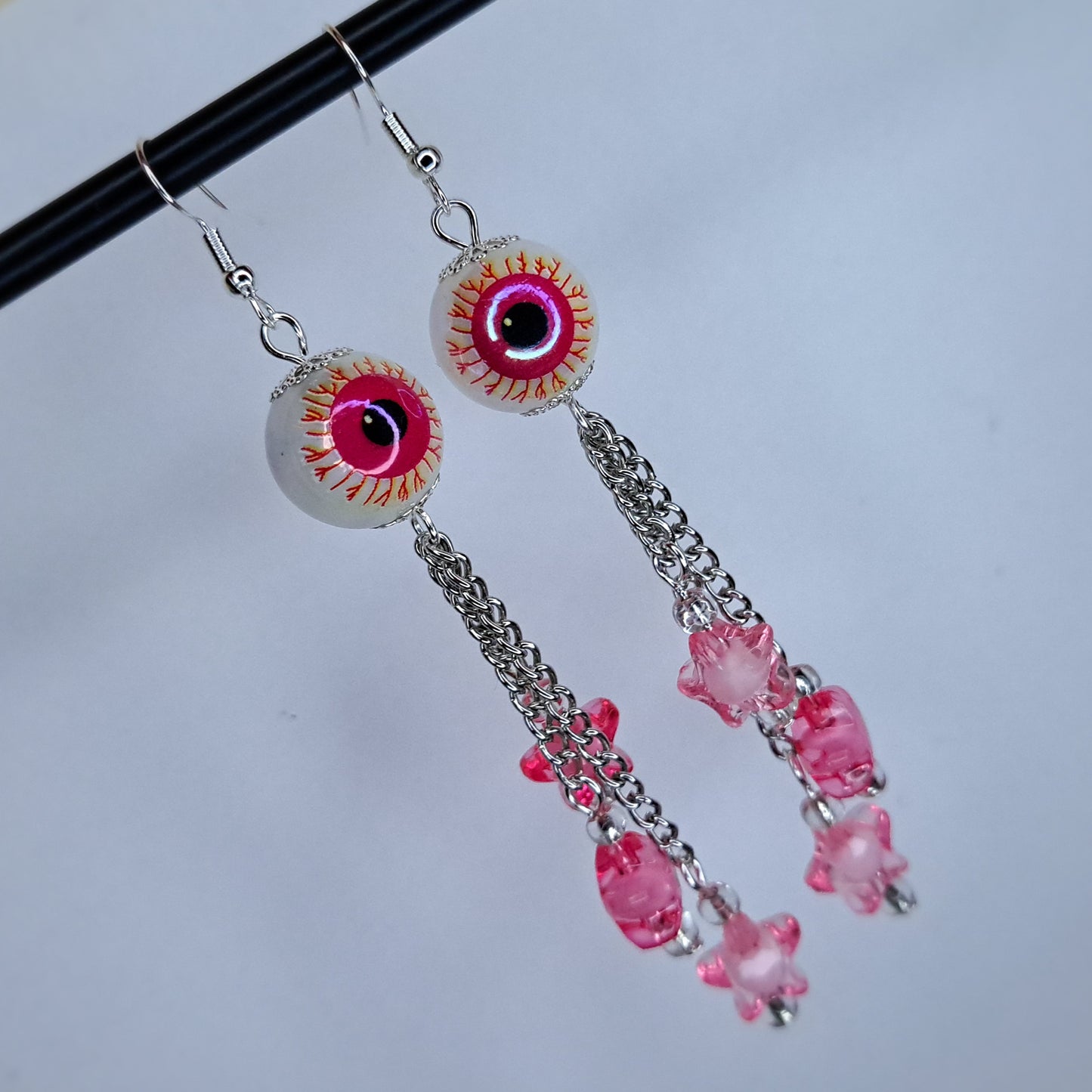 Pink eyeball stainless steel earring