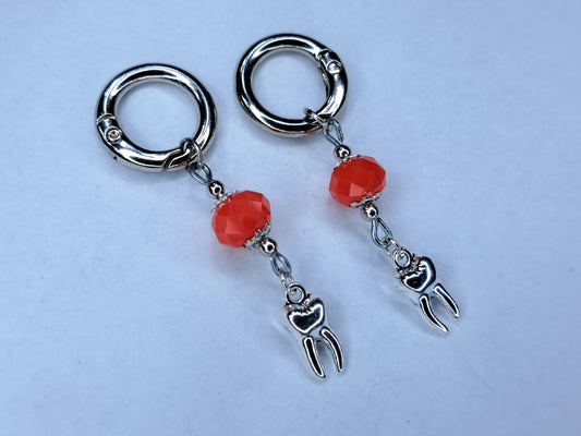(Stretched ear) Burnt orange beaded stainless steel teeth earrings