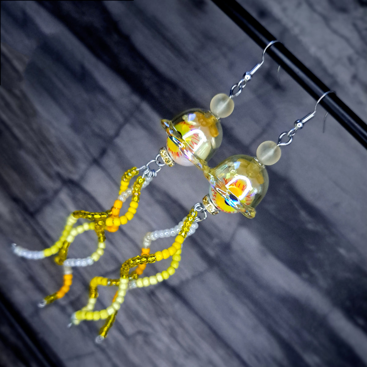 Yellow Eyeball jellyfish stainless steel earrings