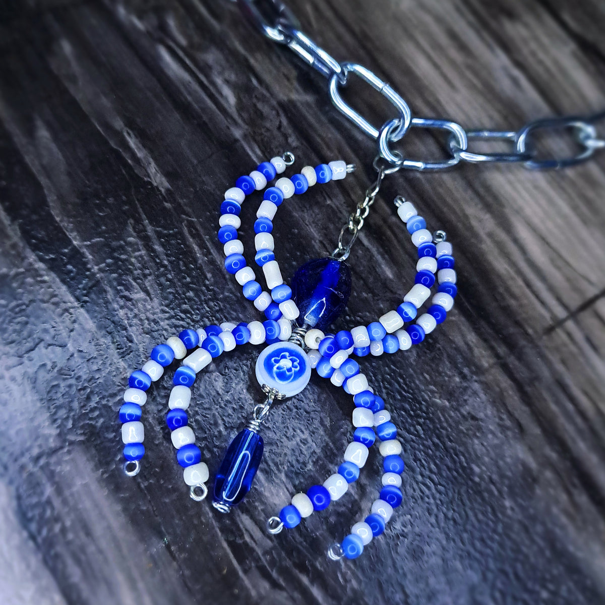 Blue and white Spider stainless steel chain choker