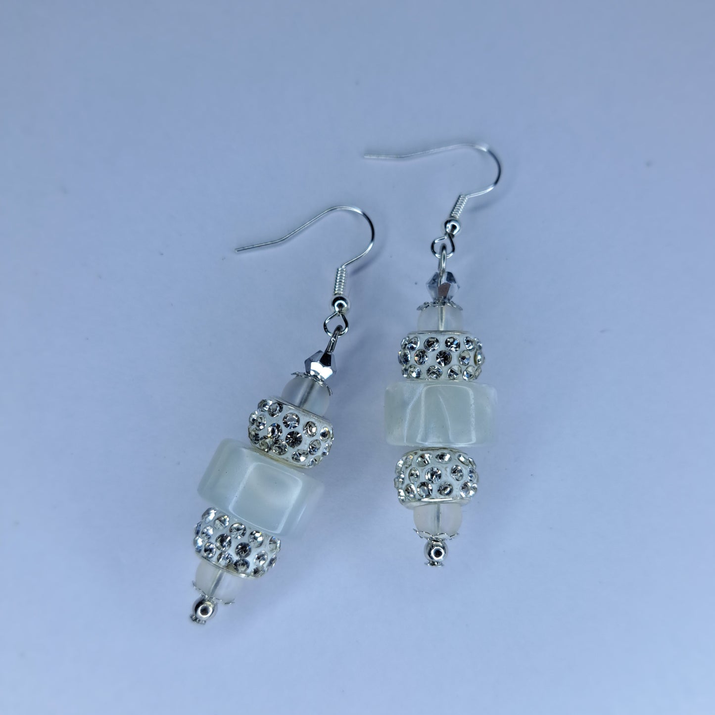 White beaded stainless steel earrings