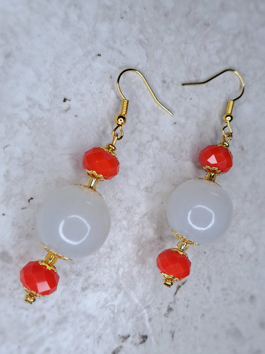 Reddish orange & white beaded gold stainless steel earrings