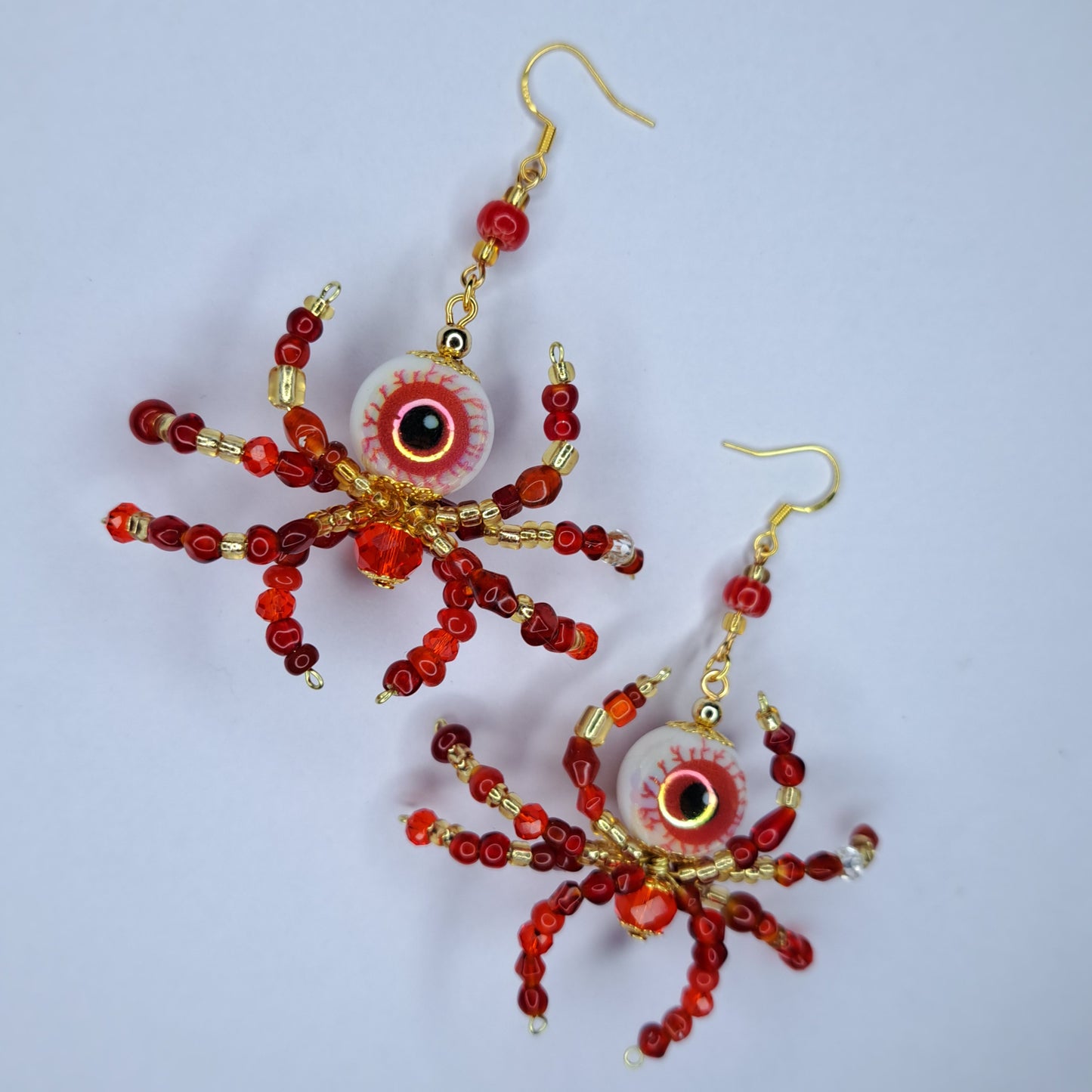 Red beaded eyeball spider gold tone s925 sterling silver earrings