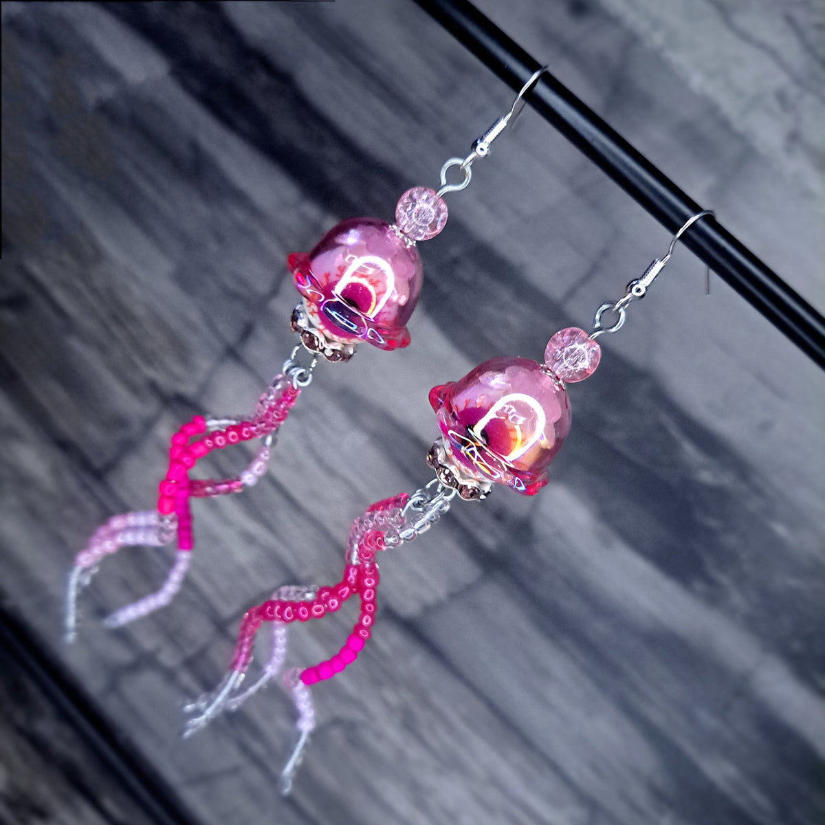 Pink Eyeball jellyfish stainless steel earrings